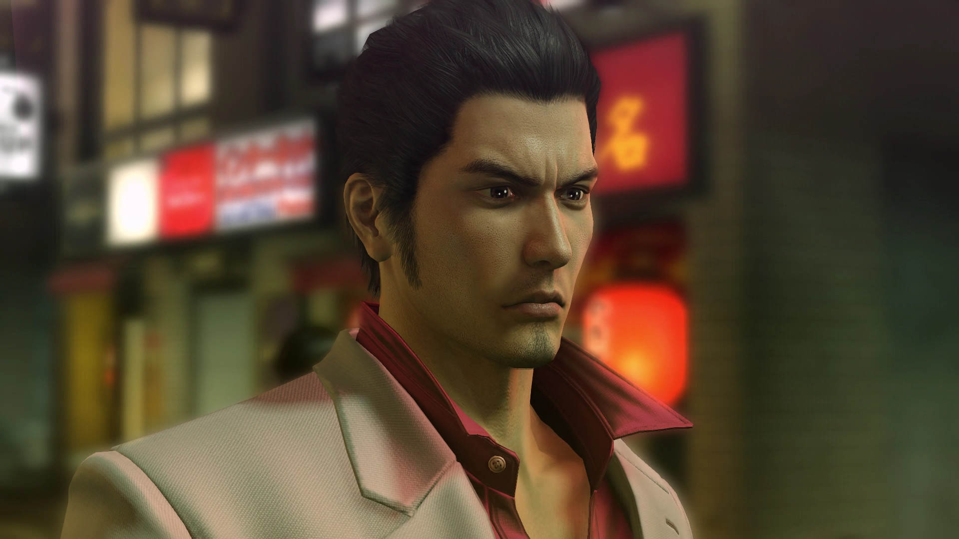 A screenshot from Yakuza Kiwami, depicting series protagonist Kazuma Kirya wearing his trademark white suit and red shirt combination.